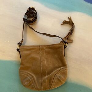 Coach camel colored suede cross body purse
NWOT